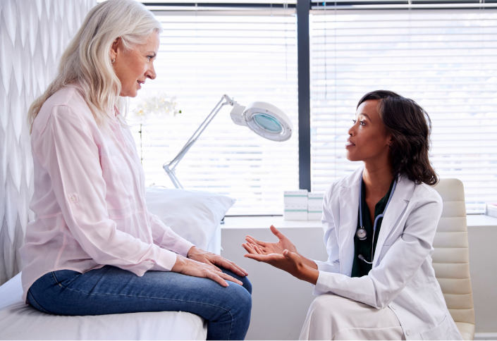 Doctor speaking to patient