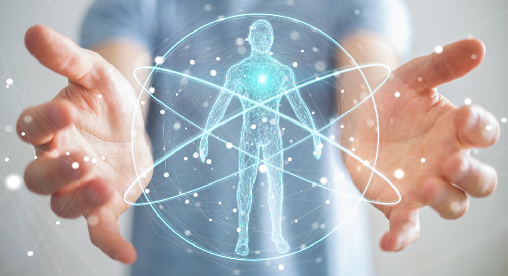 Hands hovering around holographic person